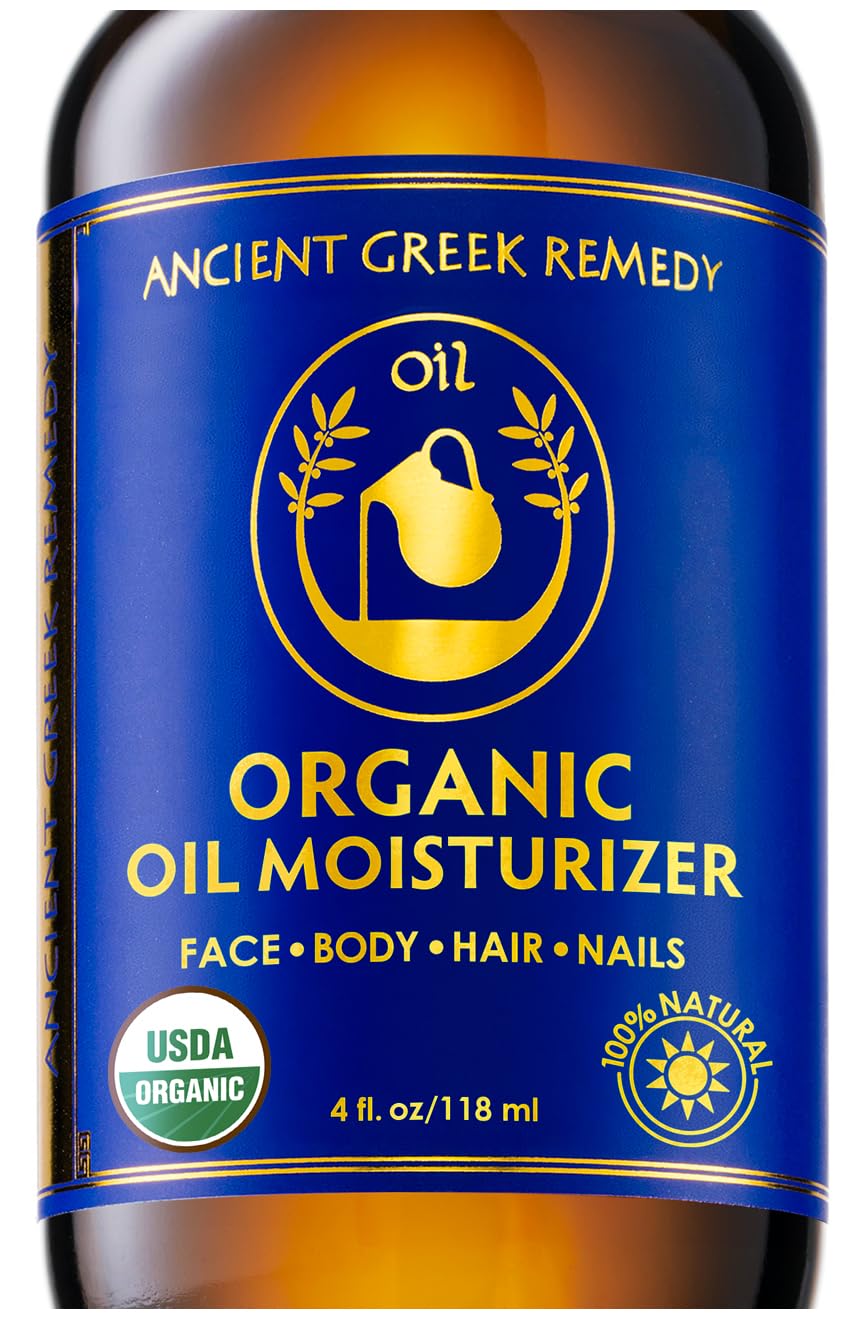 Bottle of Ancient Greek Remedy Organic Oil Moisturizer with blue label and gold accents.