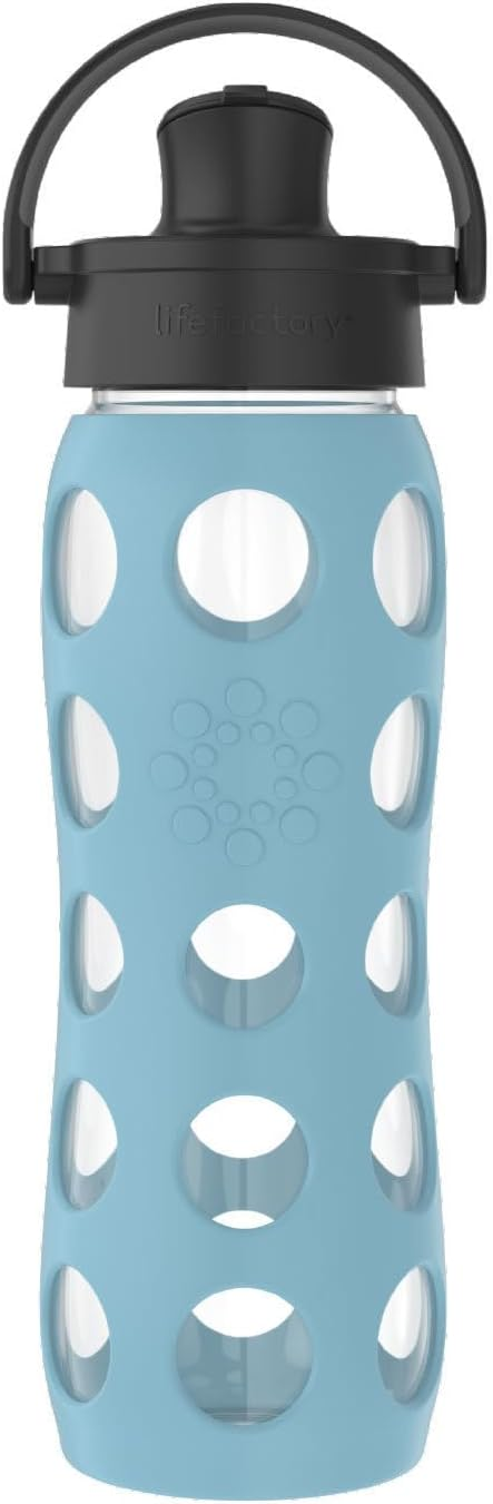 Lifefactory 22oz glass water bottle with active flip cap and denim silicone sleeve on white background