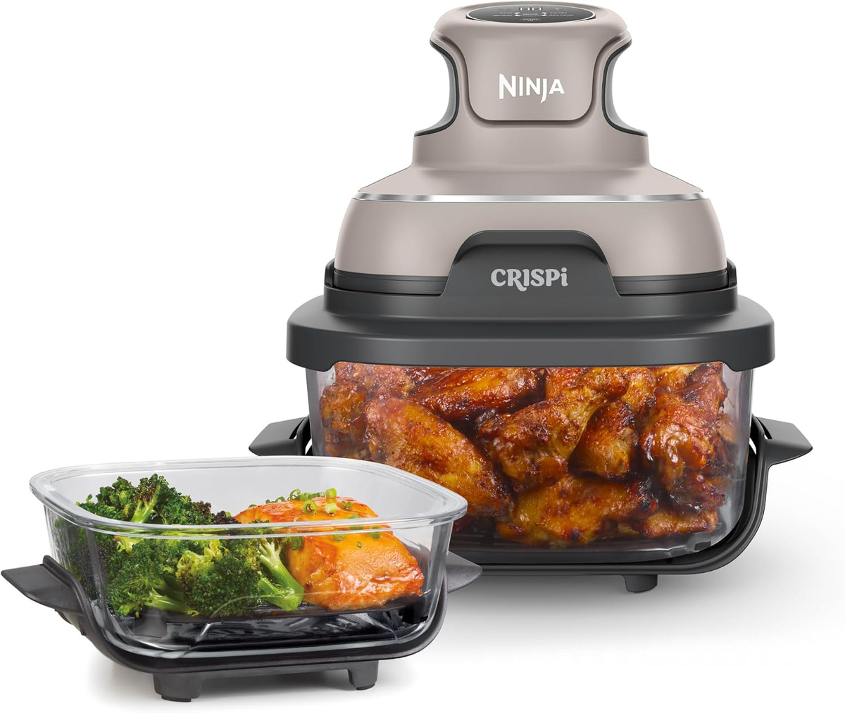 Ninja Crispi PowerPod on a glass container holding chicken, with a smaller glass container holding salmon and broccoli, on a white background.