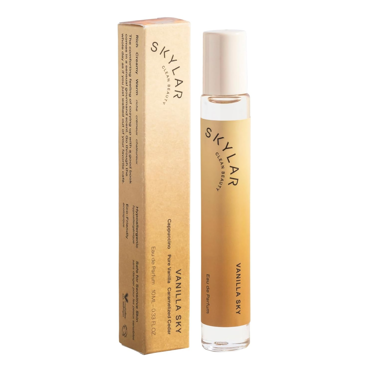 Skylar Vanilla Sky Rollerball Perfume — warm gold gradient glass bottle with box, cappuccino pure vanilla caramelized cedar scent, clean hypoallergenic vegan, 0.33 fl oz