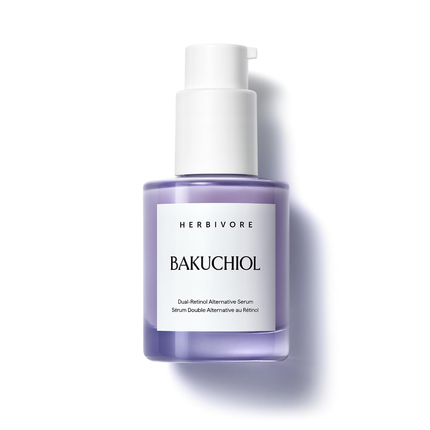 Herbivore Botanicals Bakuchiol Dual-Retinol Alternative Anti-Aging Serum in a purple glass pump bottle on a white background