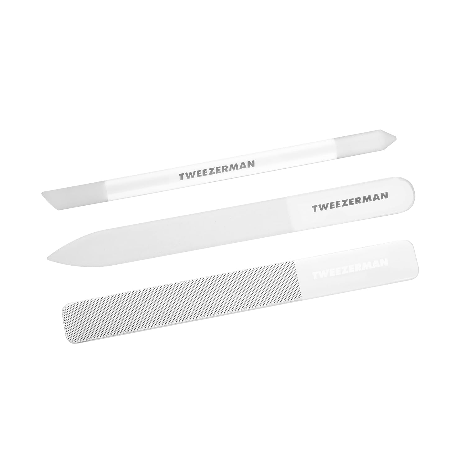Tweezerman Glass Nailcare Set — 3-piece glass nail file, cuticle pusher, and buffer on white background. Allure Award Winner reusable clean nail tools.