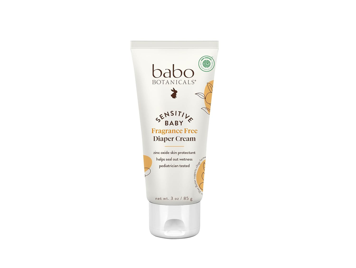 Babo Botanicals Sensitive Baby Fragrance-Free Diaper Cream with 25% zinc oxide in a white tube on a clean white background.