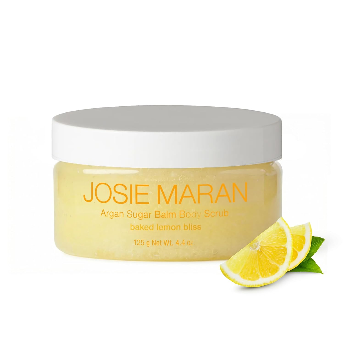Josie Maran Argan Sugar Balm Body Scrub jar, Baked Lemon Bliss scent, with fresh lemon slices on white background