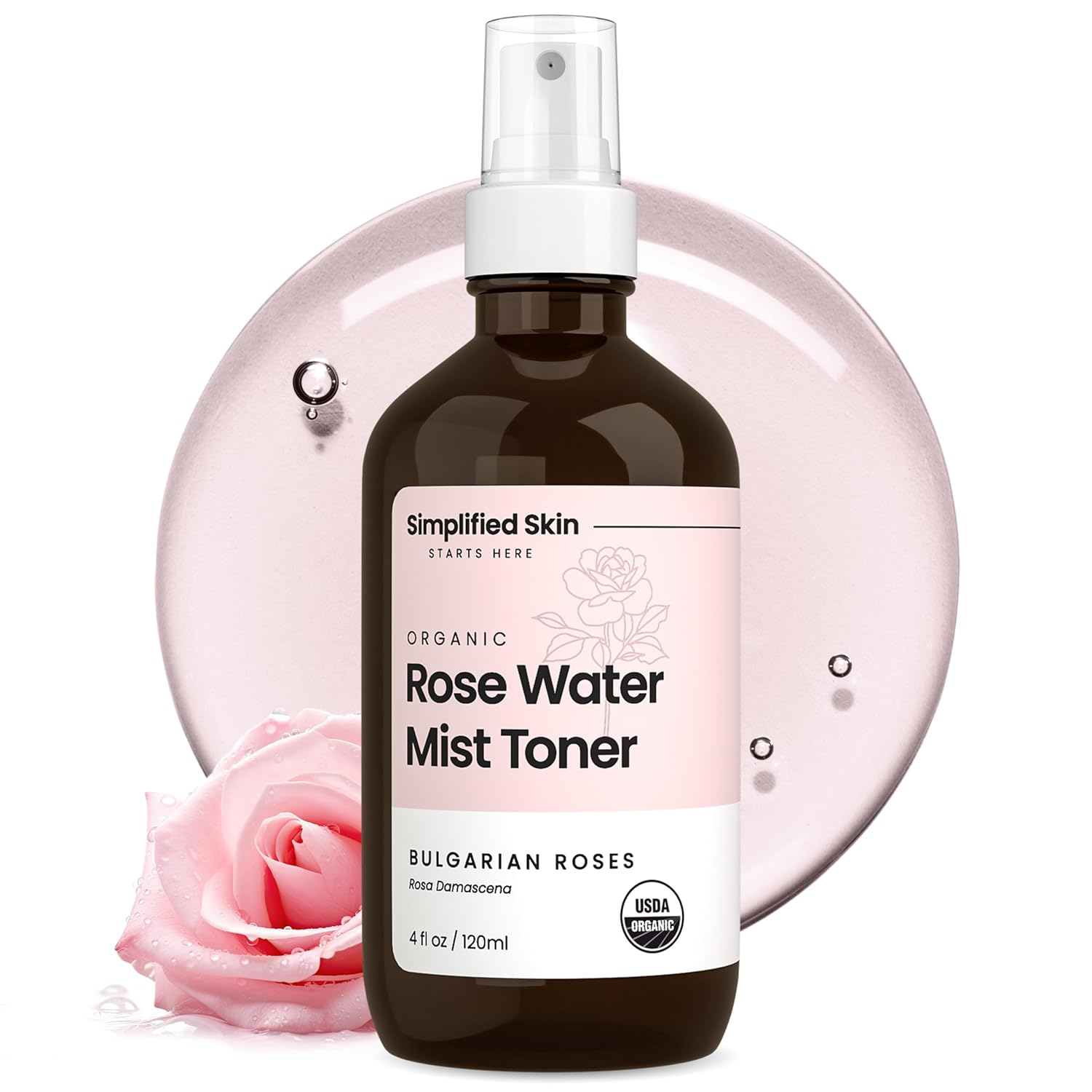Simplified Skin Organic Rose Water Mist Toner 4oz bottle with Bulgarian rose and pink water splash on white background