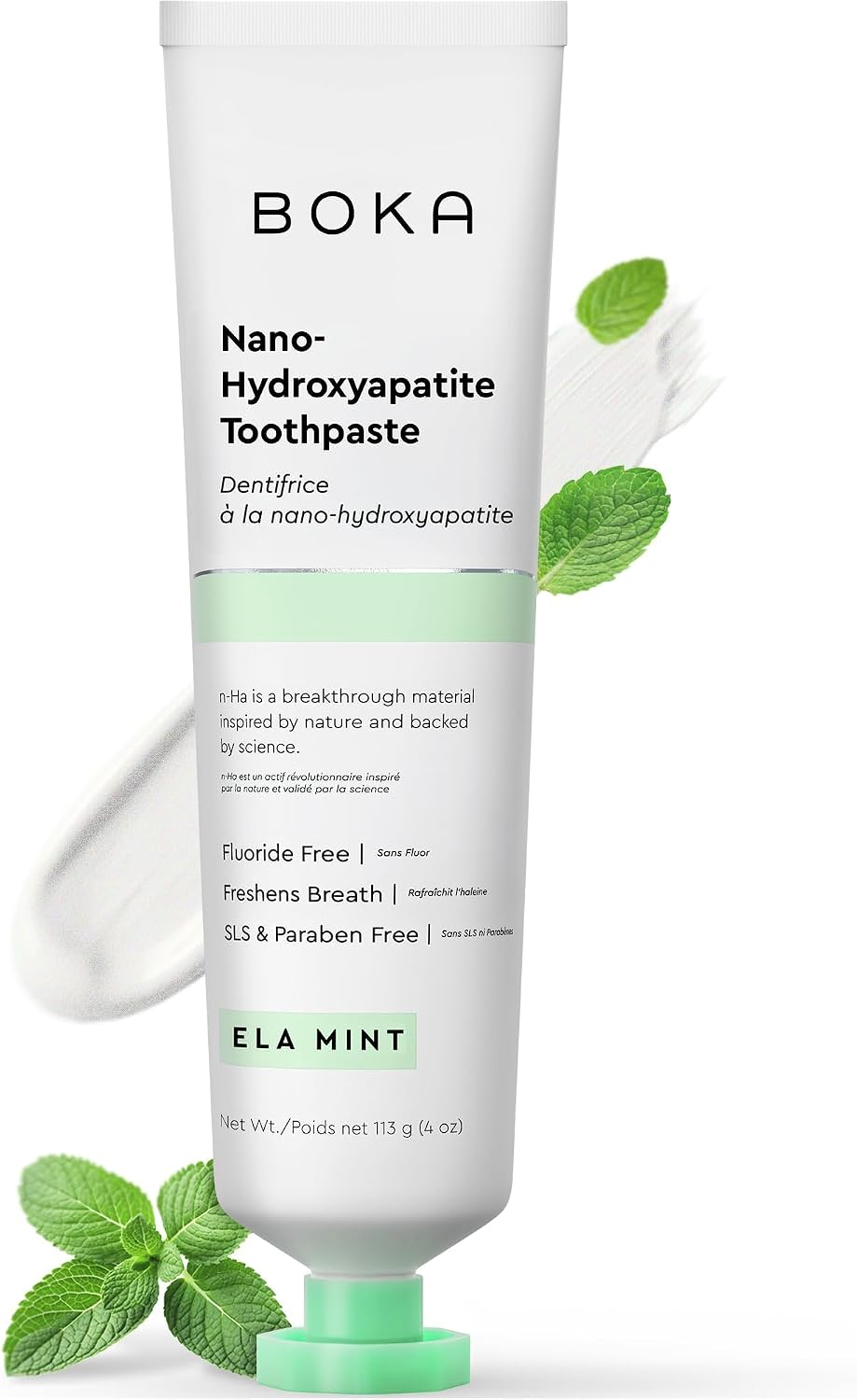 Boka Nano Hydroxyapatite Toothpaste in white tube with mint green accents and fresh mint leaves — Ela Mint flavor, fluoride-free, 4 oz, on white background