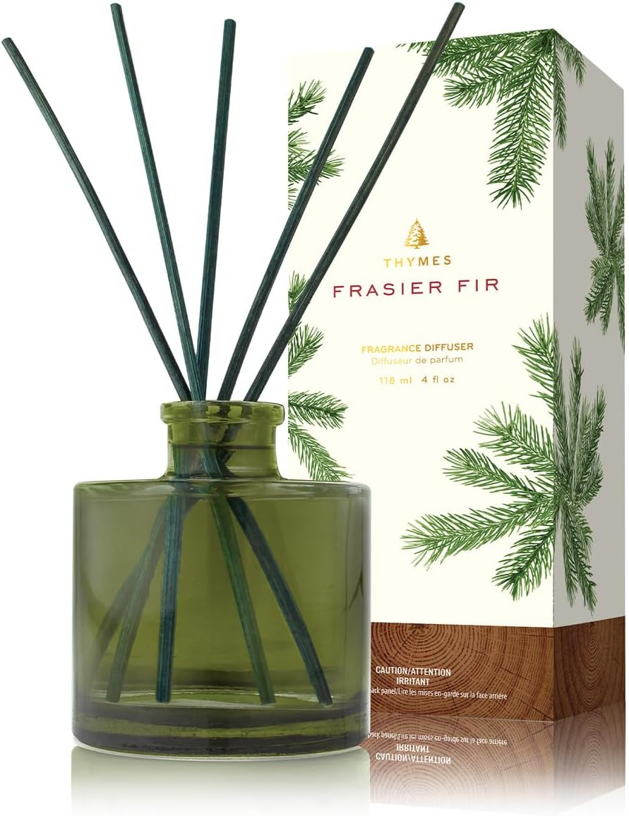 Thymes Frasier Fir Reed Diffuser Set with frosted deep green glass bottle, dark green reeds, and botanical gift box on white background