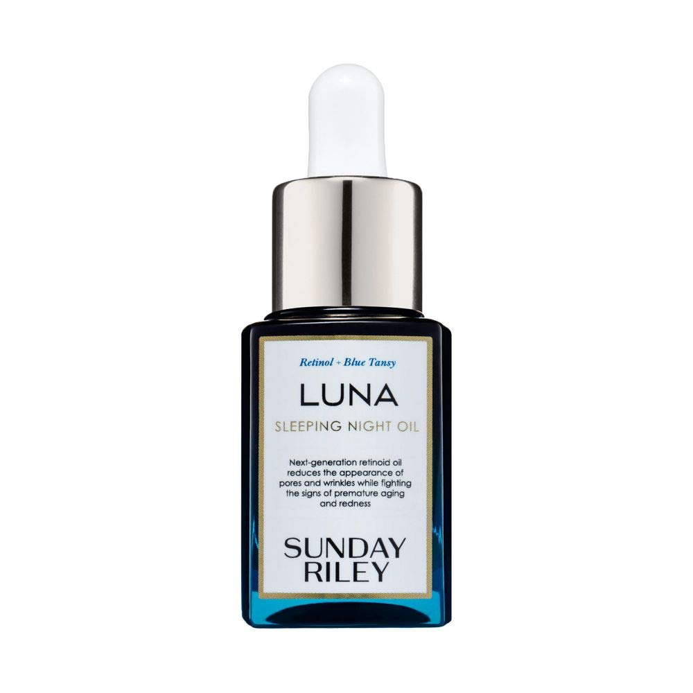 Sunday Riley Luna Retinol Sleeping Night Oil dark blue bottle with silver dropper cap on white background — retinol and blue tansy night face oil at BodyWell1
