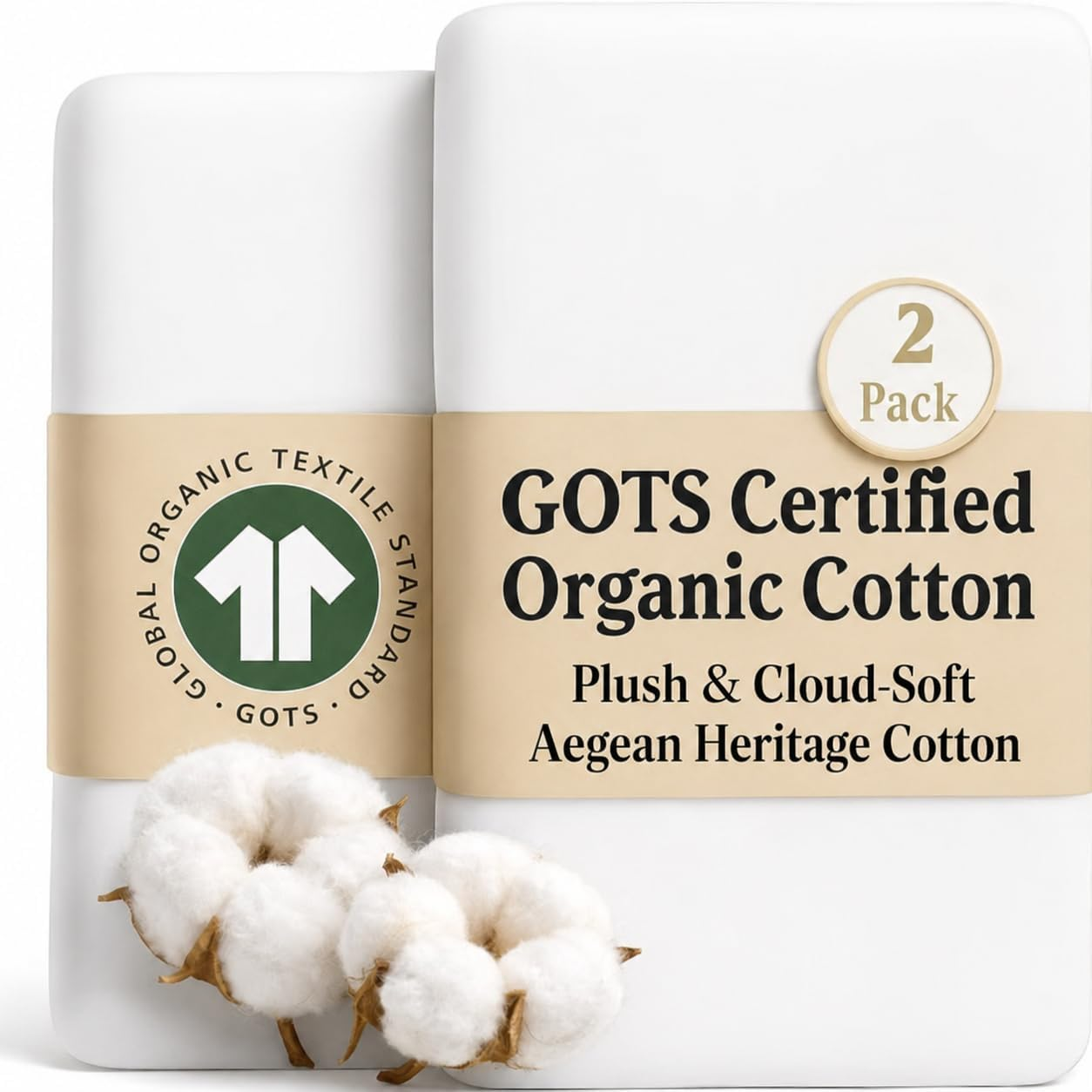Two white folded GOTS Certified Organic Cotton bassinet sheets in packaging with tan kraft paper band showing Global Organic Textile Standard seal and Plush Cloud-Soft Aegean Heritage Cotton text with cotton bolls at bottom