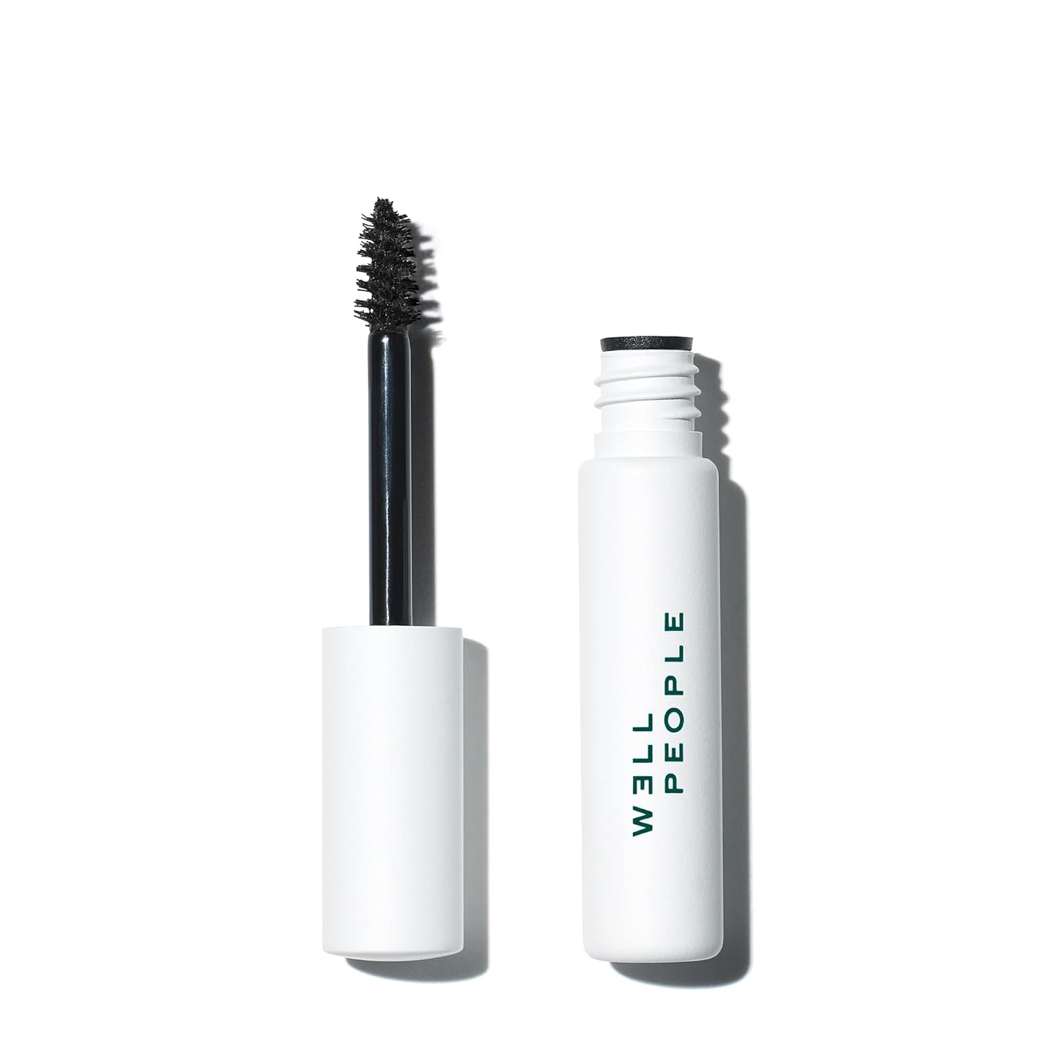 W3ll People Expressionist Brow Gel in Black — white tube with wand applicator, clean vegan tinted brow gel for fuller-looking brows