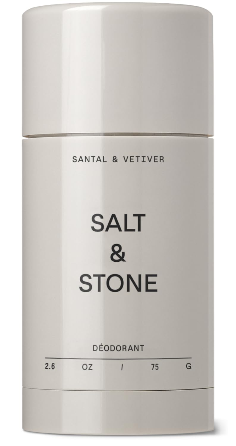Salt & Stone Aluminum-Free Deodorant in Santal & Vetiver scent, minimalist warm gray cylindrical packaging with clean serif typography, 2.6 oz, on a white background.