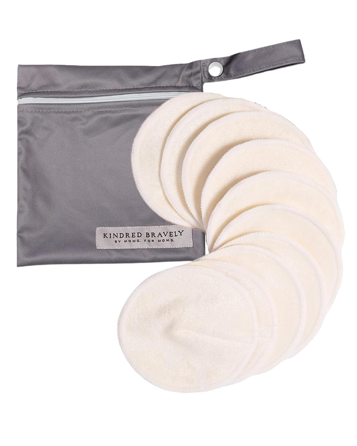 Kindred Bravely organic bamboo reusable nursing pads fanned out beside grey waterproof wet bag on white background