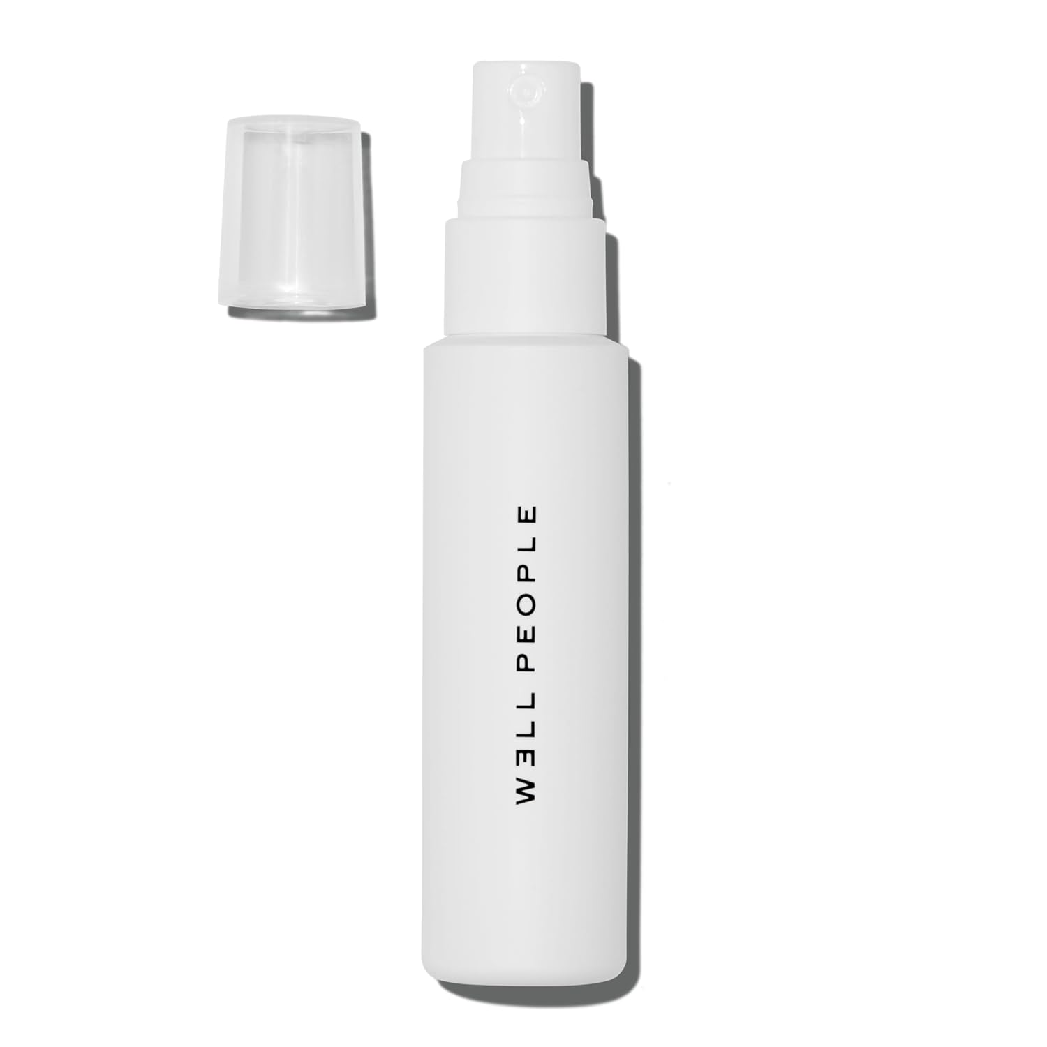 W3ll People Dew You Makeup Mist white spray bottle with cap off on white background — USDA Organic 3-in-1 setting spray
