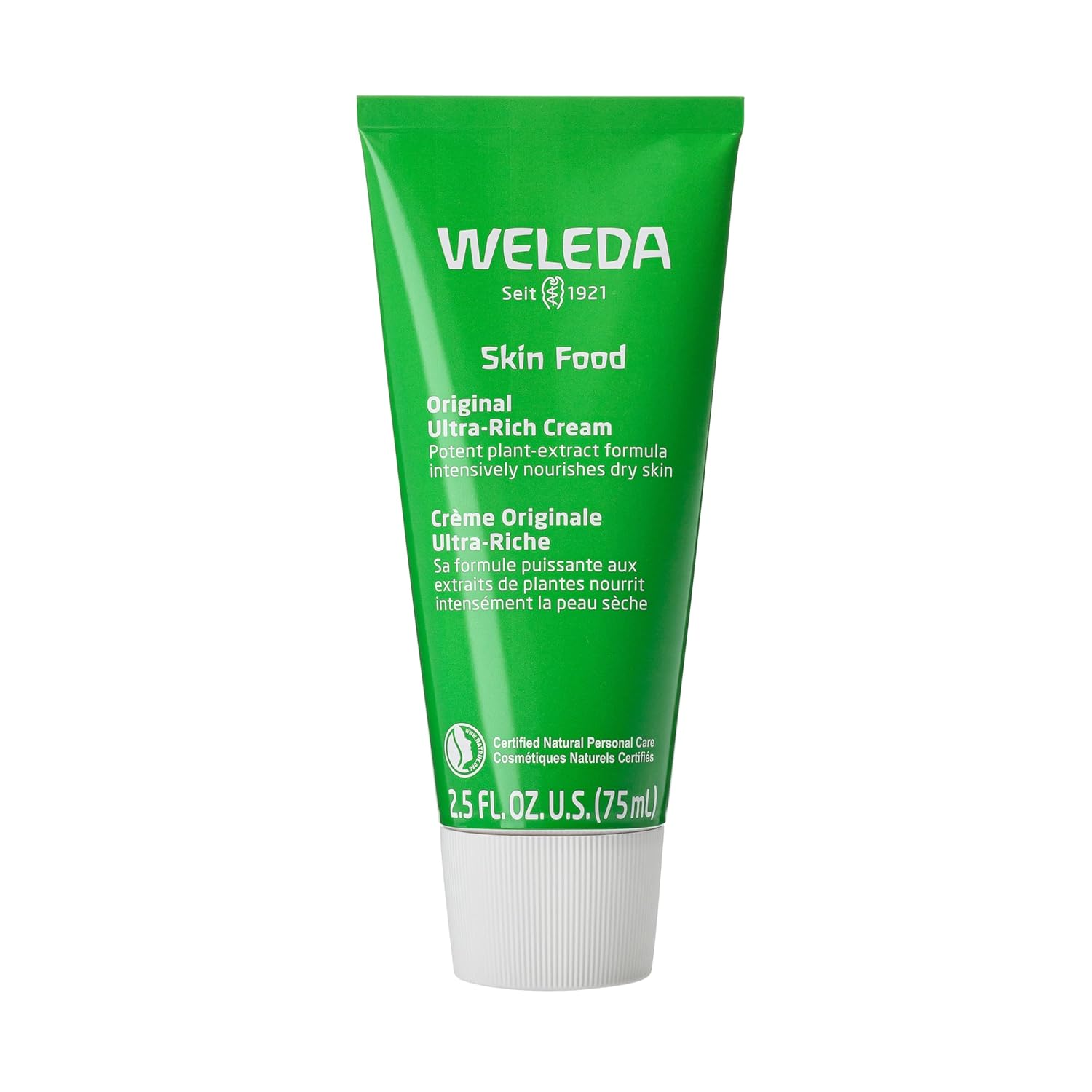 Green tube of Weleda Skin Food on a white background